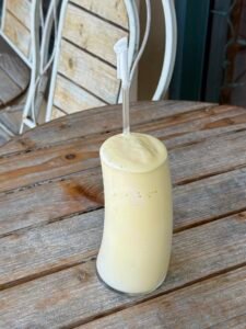Creamy tropical protein shake with mango and banana.