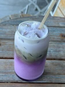 Iced Ube Matcha Latte with creamy milk, ceremonial-grade matcha, ube, and cold foam.