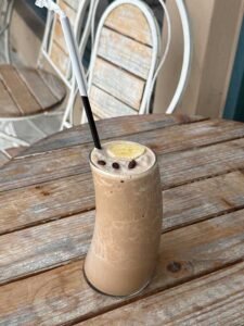 Creamy chocolate mocha protein smoothie with banana